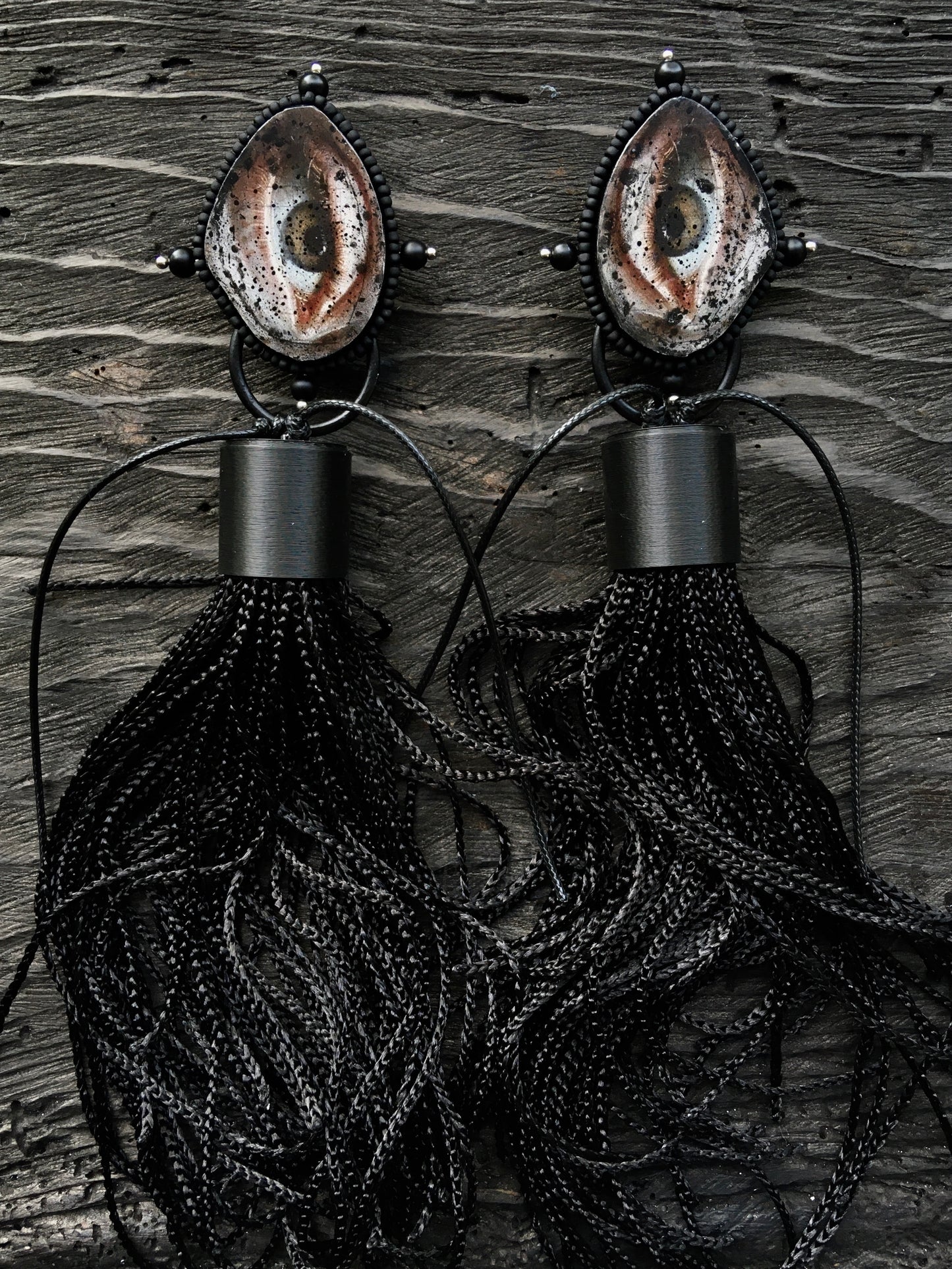 EYE EARRINGS WITH TASSEL