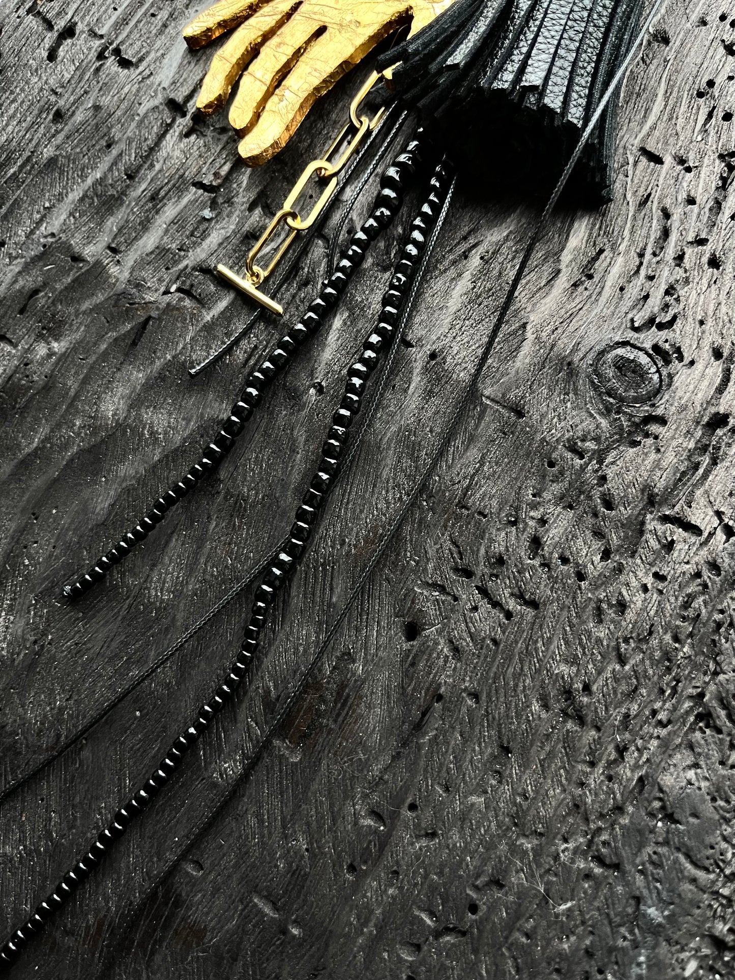 BROOCH WITH GOLDEN HAND PENDANT