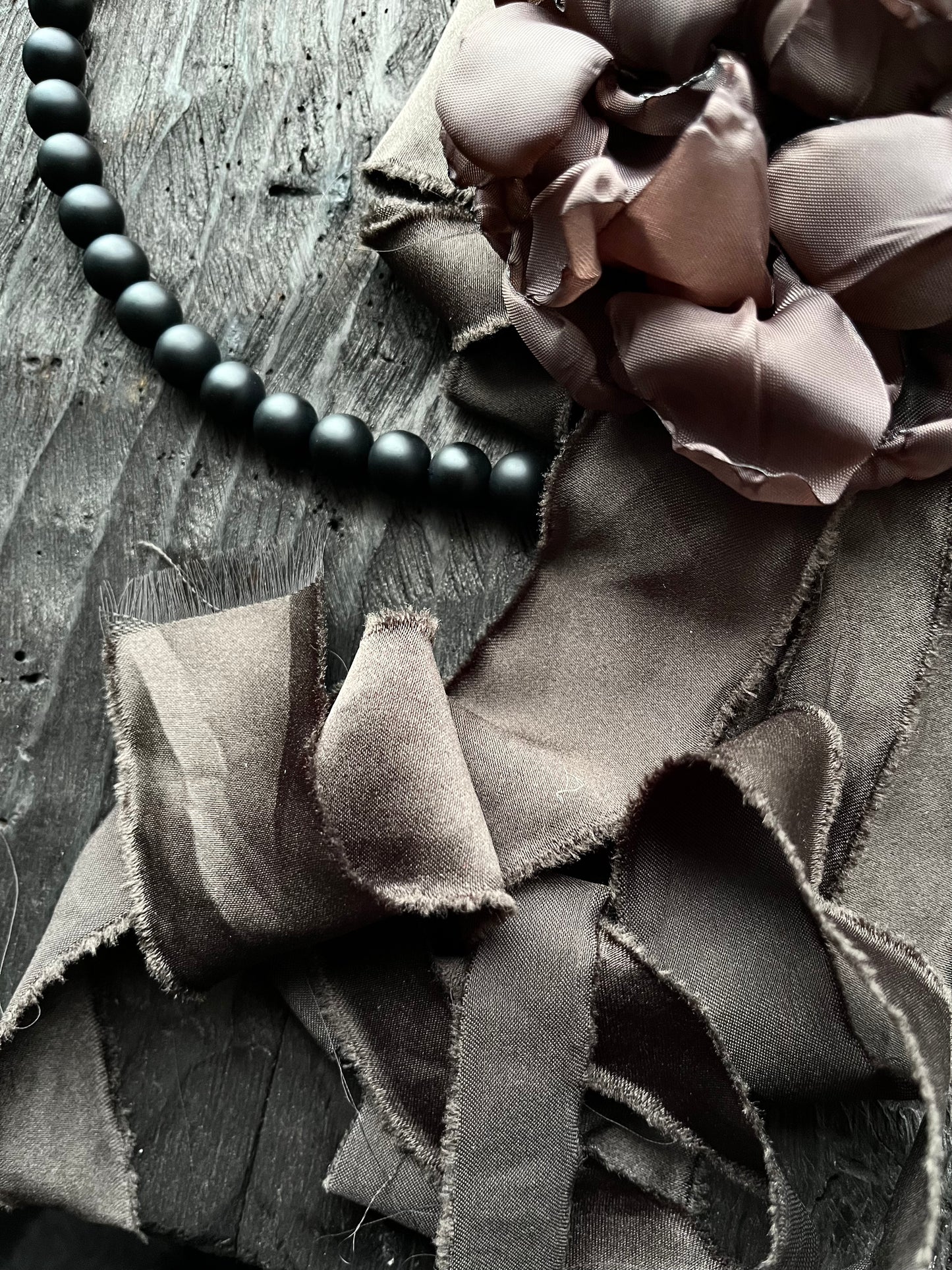 BROOCH AND ONYX NECKLACE
