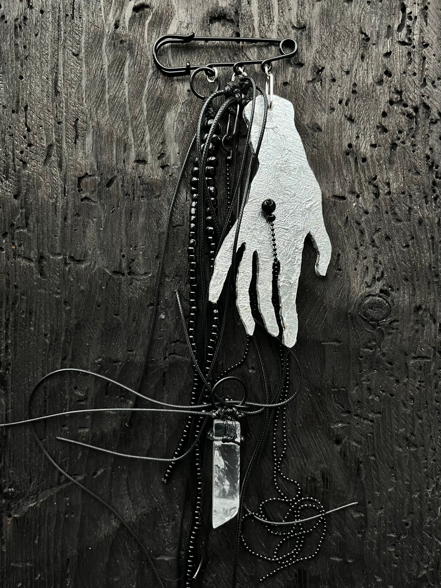 BROOCH WITH SILVER HAND PENDANT