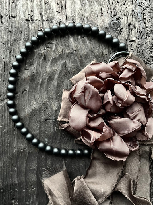 BROOCH AND ONYX NECKLACE